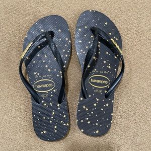 Havaianas black gold star flip flops Worn once